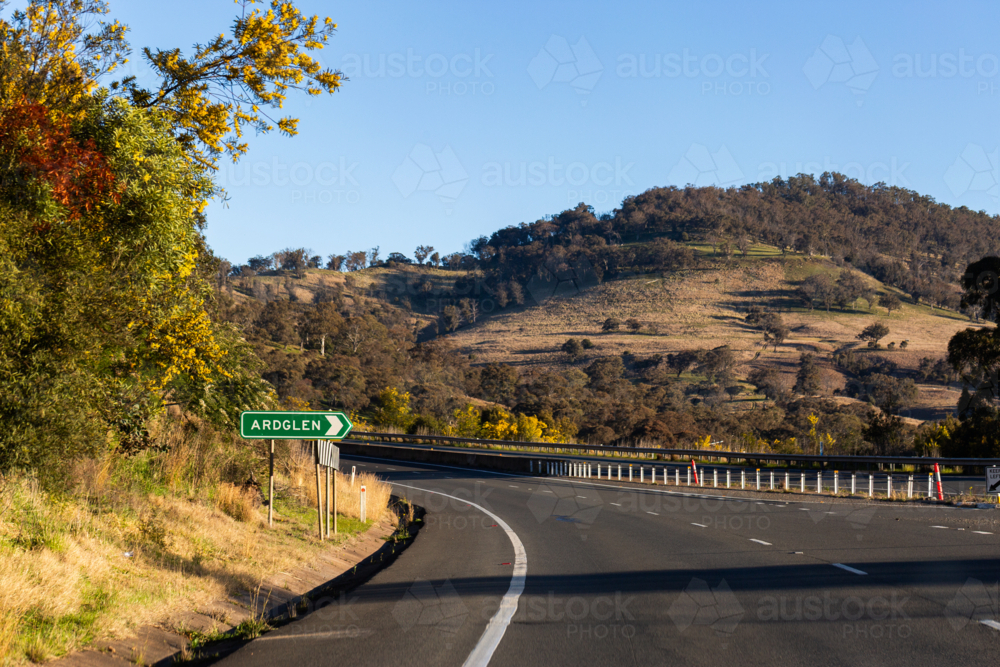 Highway road through great dividing range in Australia with barrier dividing road - Australian Stock Image