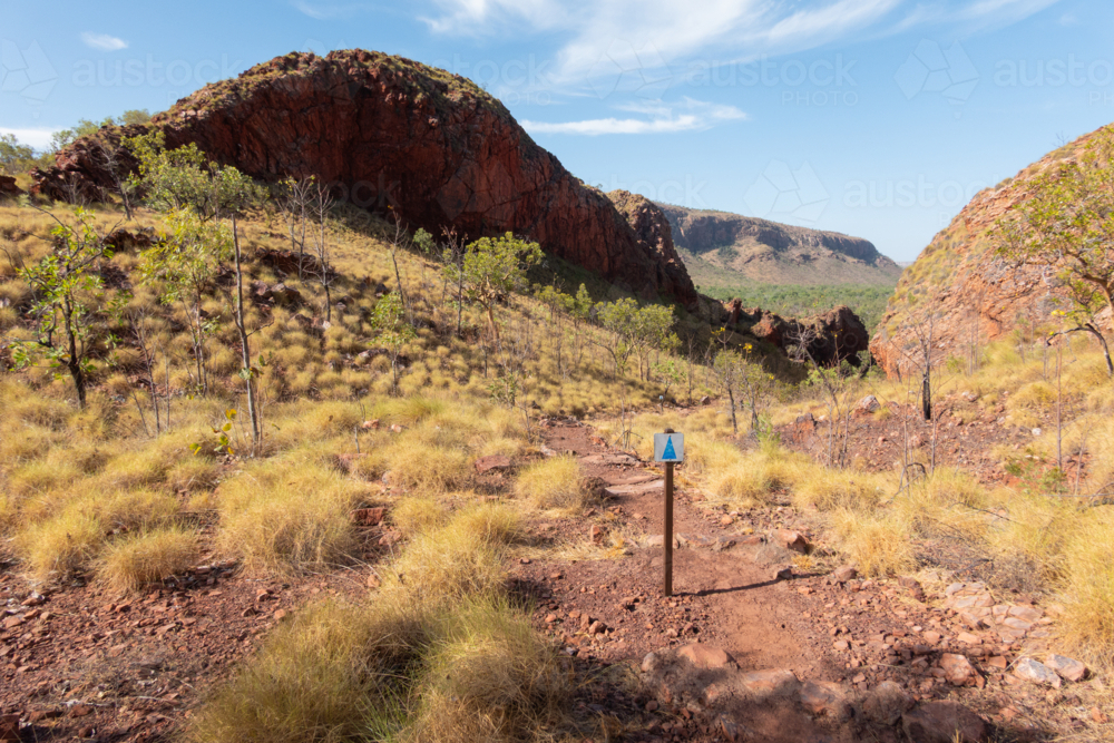Hiking trail and arrow markers in Northern Territory - Australian Stock Image