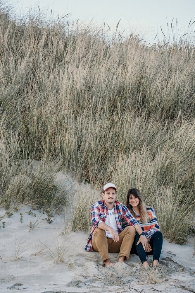 Hip young couple at the beach. - Australian Stock Image