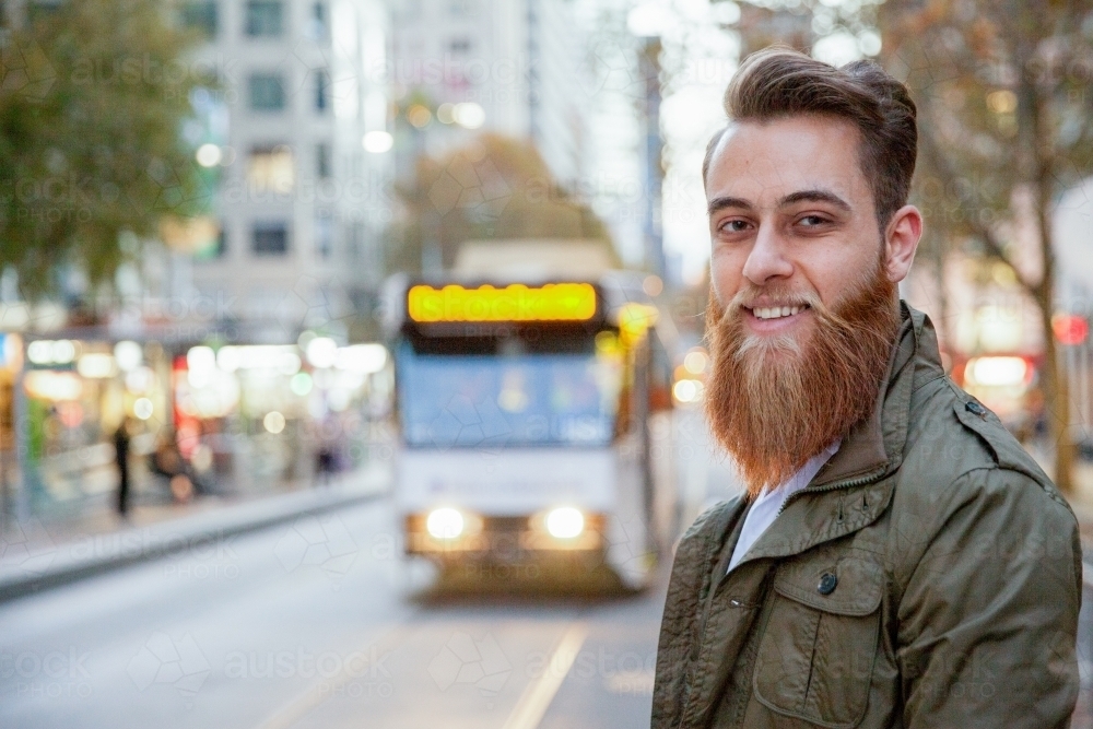 Hipster Man Waiting for Tram - Australian Stock Image