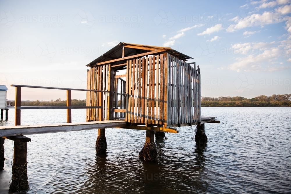 historical boat house on a river in Queensland - Australian Stock Image