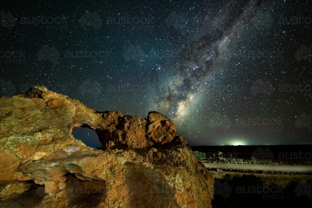 Hole in the rock under the milky way - Australian Stock Image