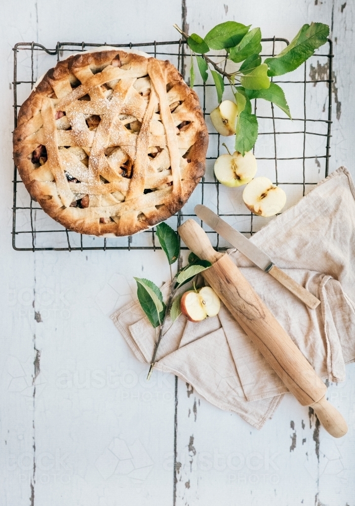 Home baked apple pie cooling on a rack - Australian Stock Image