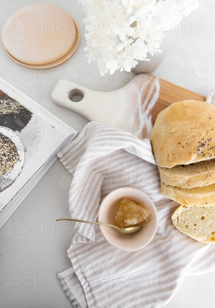 Homemade Bread with Honey and a Cookbook - Australian Stock Image