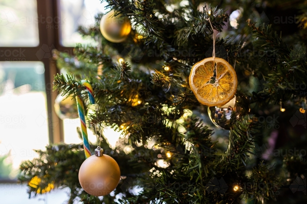 Homemade christmas tree decoration on plastic pine tree - Australian Stock Image