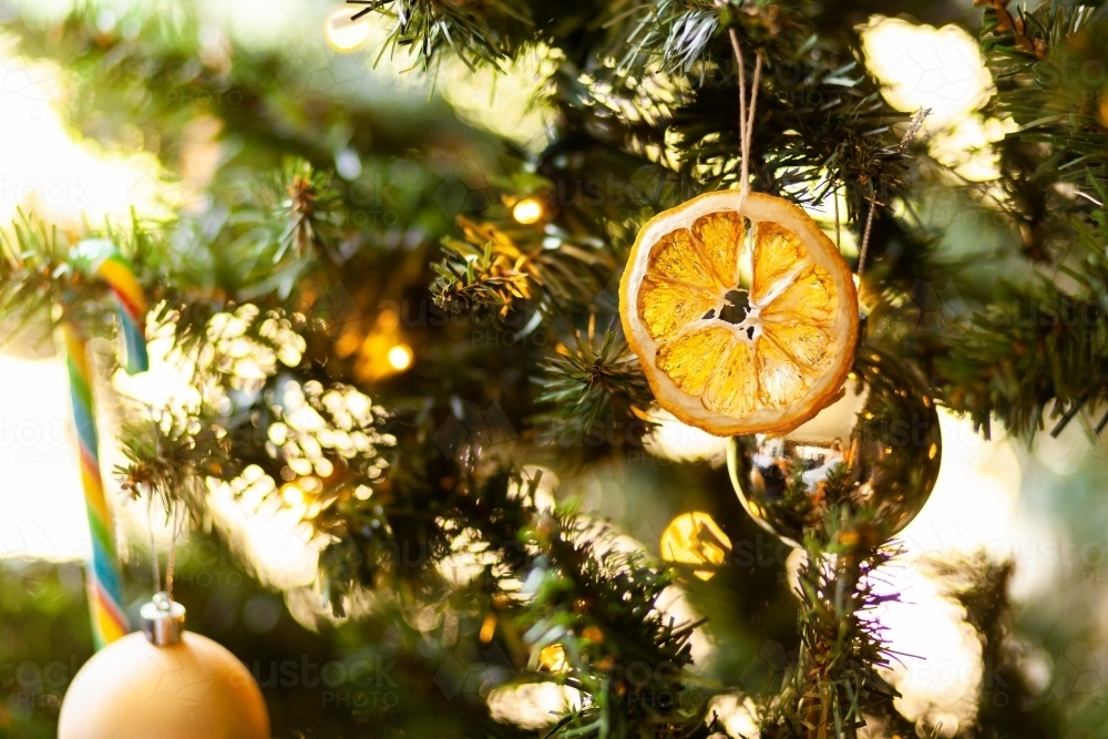 Homemade christmas tree decoration on plastic pine tree - Australian Stock Image