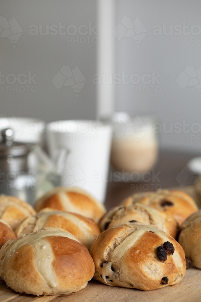 homemade hot cross buns on the table ready for smoko - Australian Stock Image