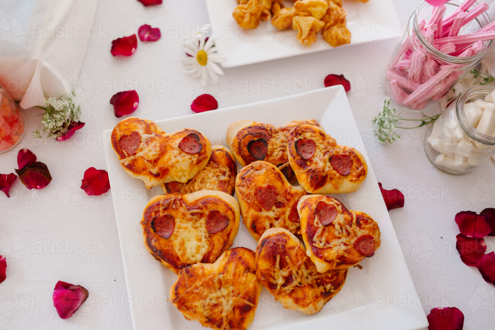 Homemade loveheart party pizza- horizontal - Australian Stock Image