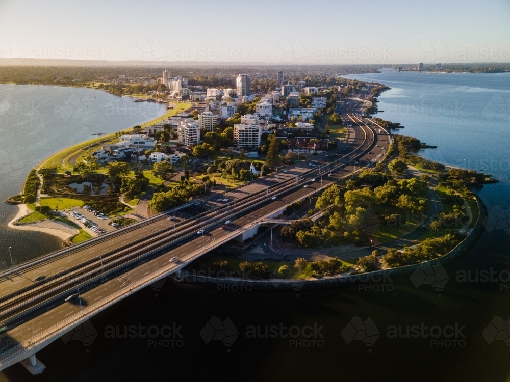 Cars crossing Narrows Bridge across the Swan River on a sunny day - Australian Stock Image