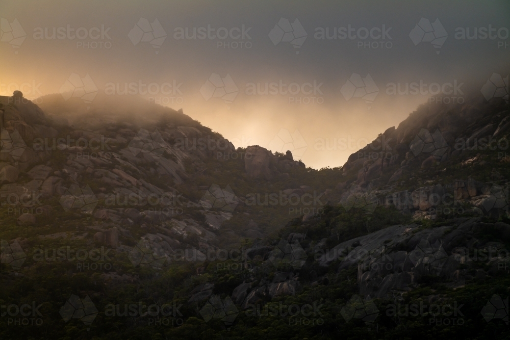 Horizontal shot of a dramatic sky over the mountains - Australian Stock Image