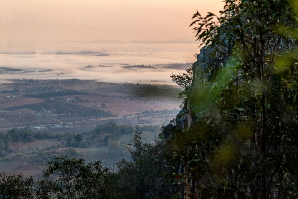 Horizontal shot of a hill station on a misty foggy weather - Australian Stock Image
