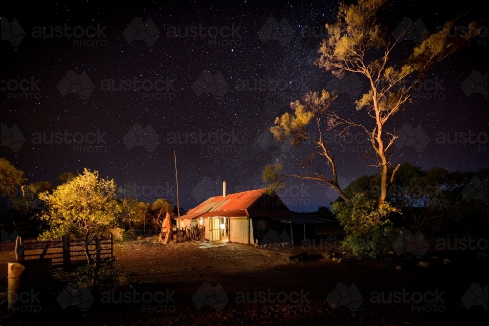 Horizontal shot of a house under the night sky - Australian Stock Image