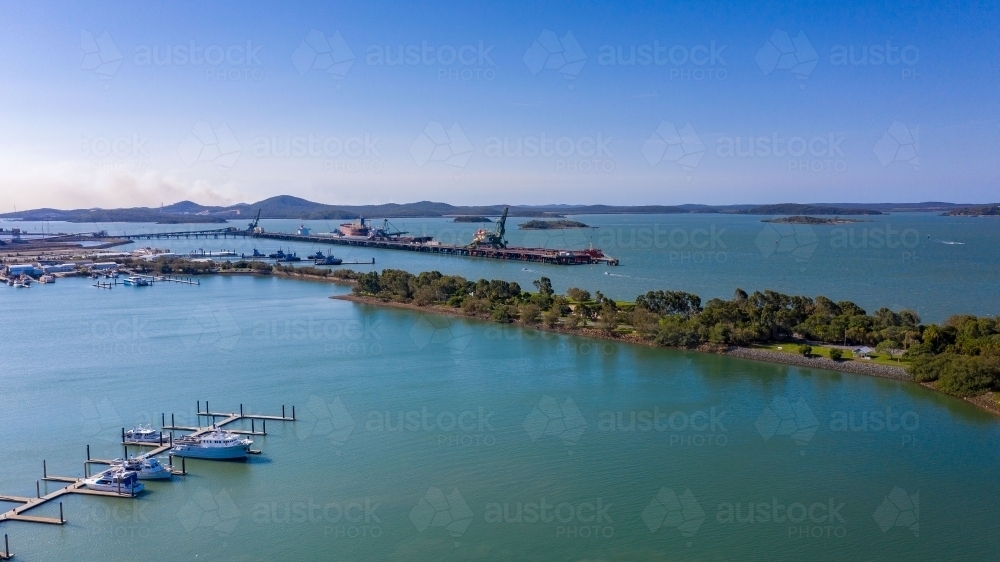 Horizontal shot of a port and park with islands in background - Australian Stock Image