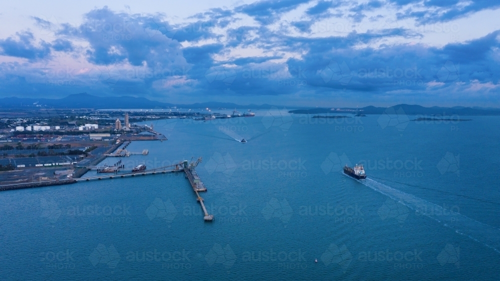 Horizontal shot of a port and ships sailing - Australian Stock Image