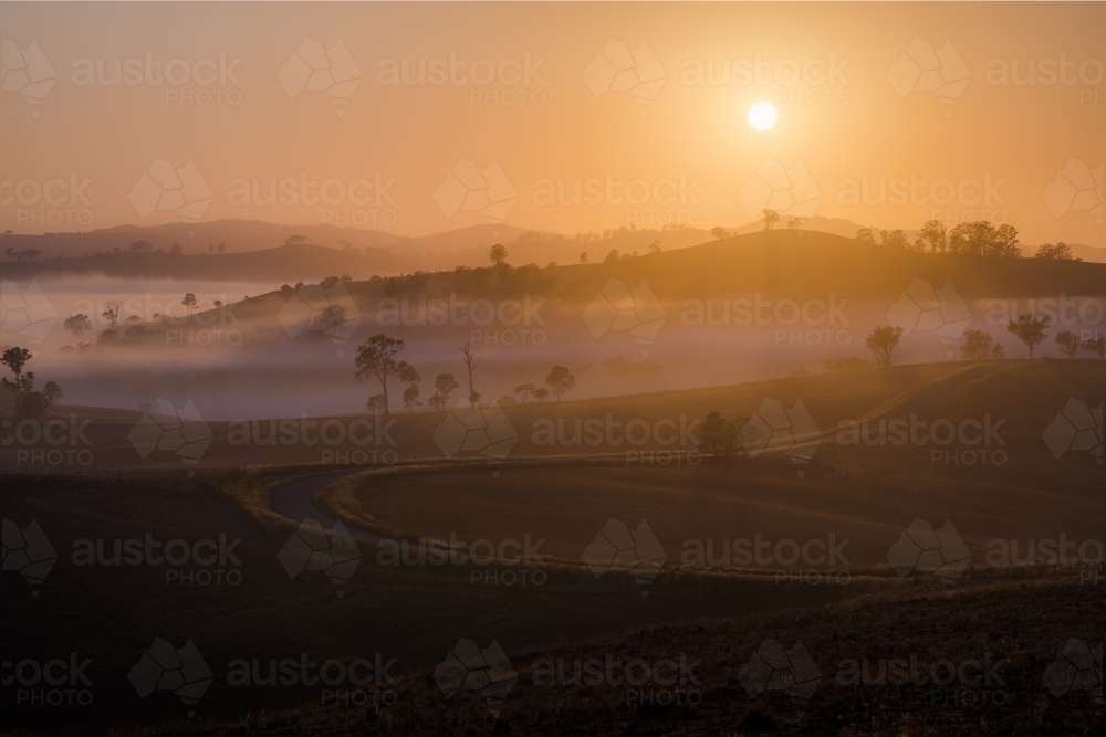 Horizontal shot of a valley at Gloucester at dawn. - Australian Stock Image