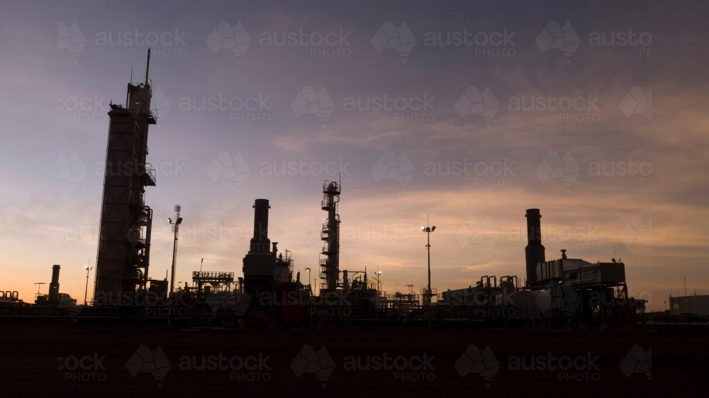 Horizontal shot of an industrial plant at dawn - Australian Stock Image