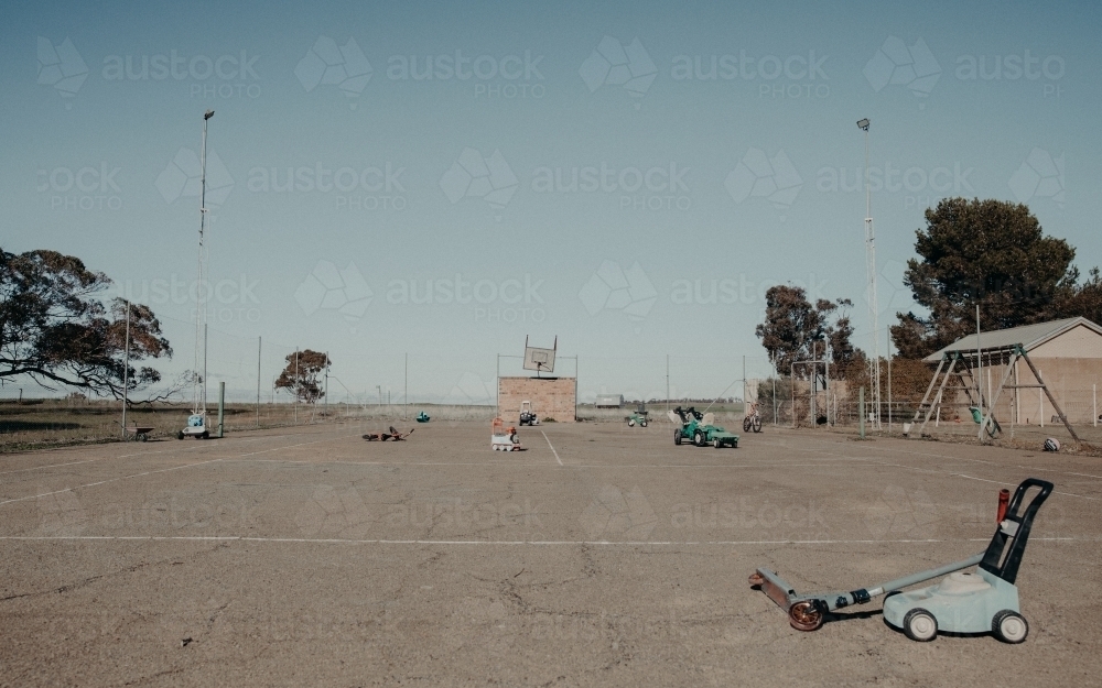 Horizontal shot of children's toys left in the playground - Australian Stock Image