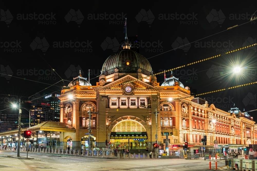 Horizontal shot of Flinders Station at night - Australian Stock Image