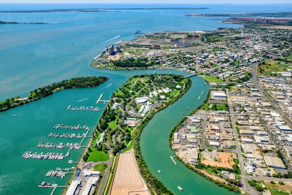 Horizontal shot of  liquified natural gas plant and LNG ship on Curtis Island, Queensland - Australian Stock Image
