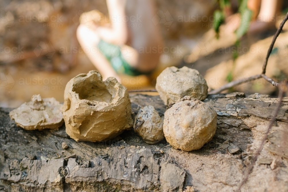 Horizontal shot of mud moulded objects - Australian Stock Image