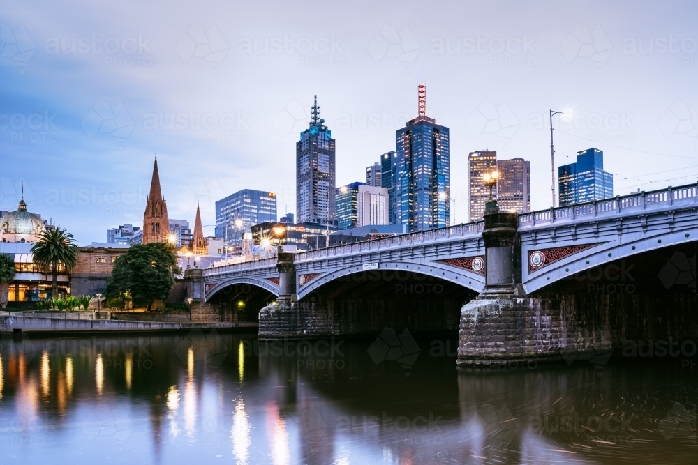 Horizontal shot of Princes Bridge and city buildings on the Yarra River - Australian Stock Image