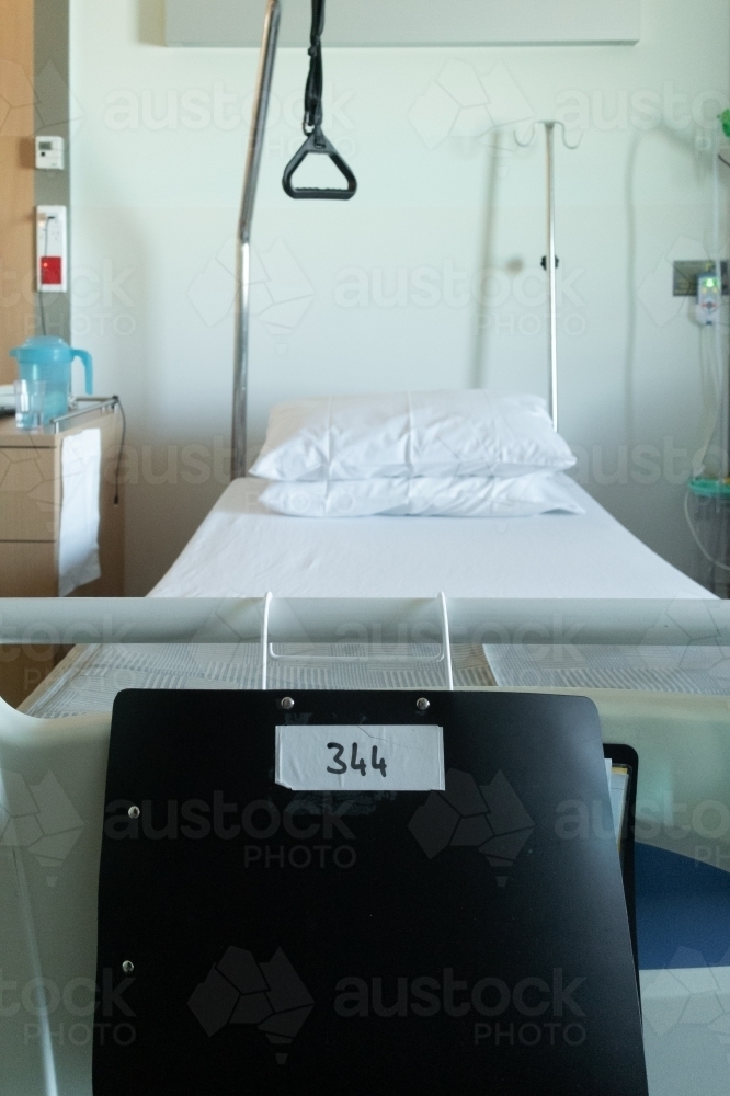 Image of Hospital bed with disability aid Austockphoto