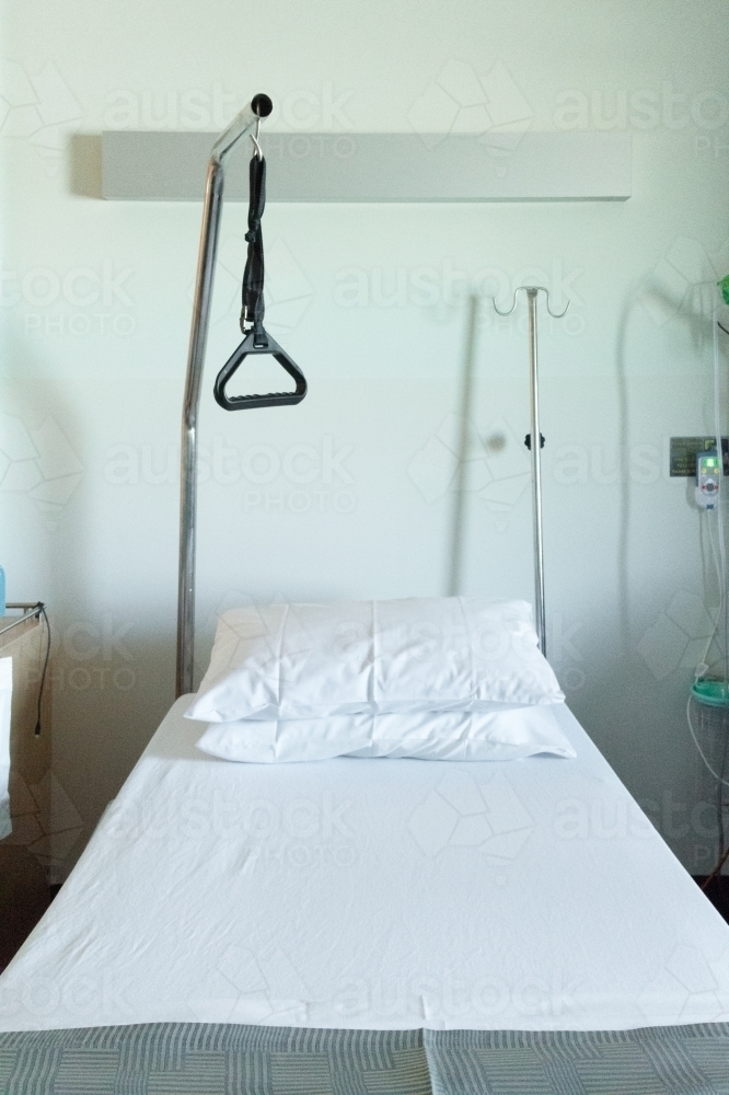 Image of Hospital bed with disability aid Austockphoto