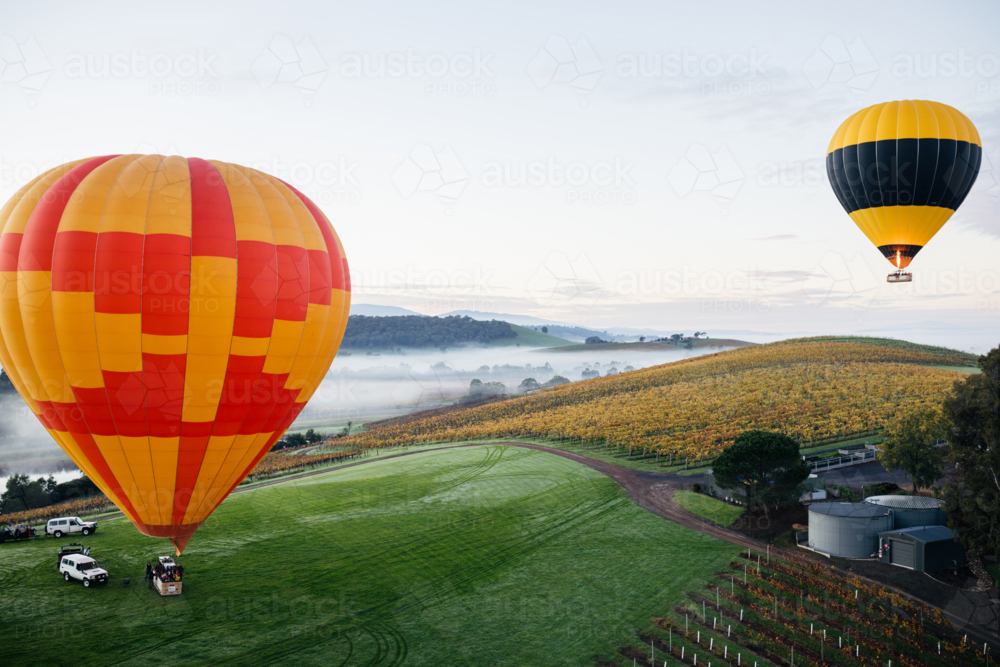 Hot Air Ballooning taking off on cold morning - Australian Stock Image