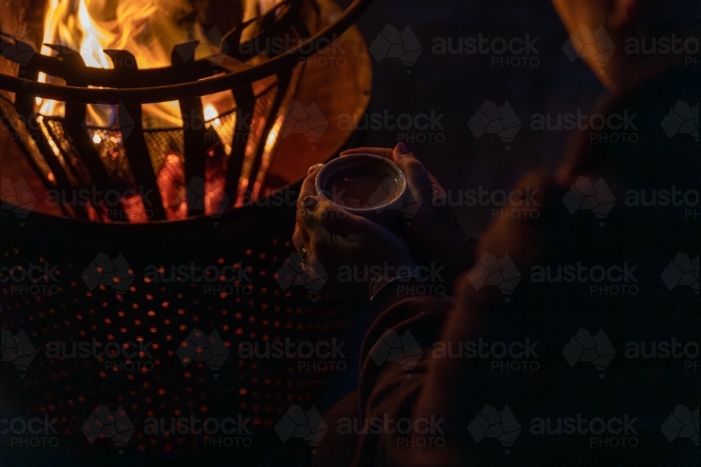 Firepit with hot chocolate - Australian Stock Image