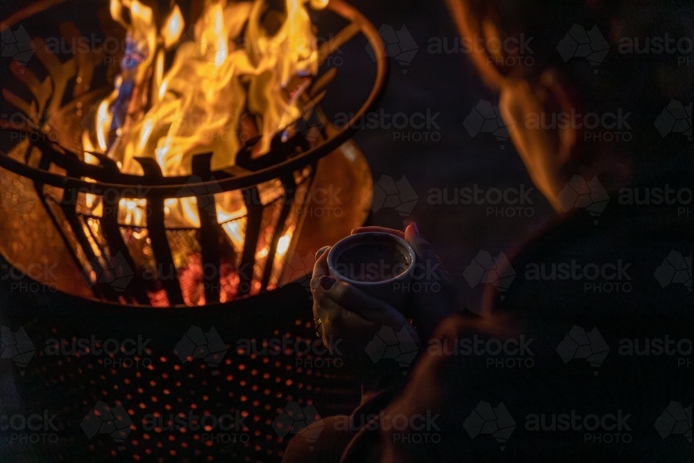 Firepit with hot chocolate - Australian Stock Image