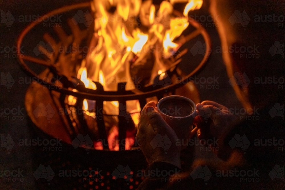 Hot chocolate and firepit - Australian Stock Image