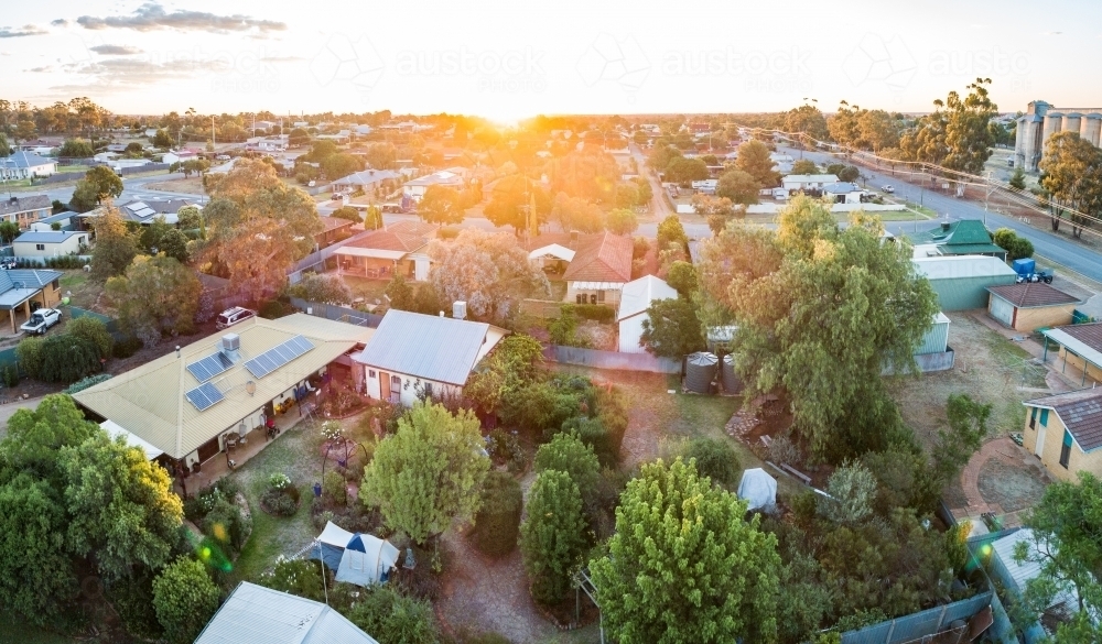 House and garden at sunset in small town - Australian Stock Image