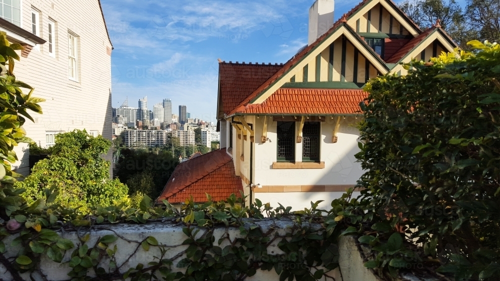 House in the eastern suburbs of Sydney with city skyline in the background - Australian Stock Image