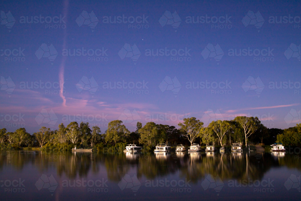 Houseboats at blue hour on the Murray River - Australian Stock Image
