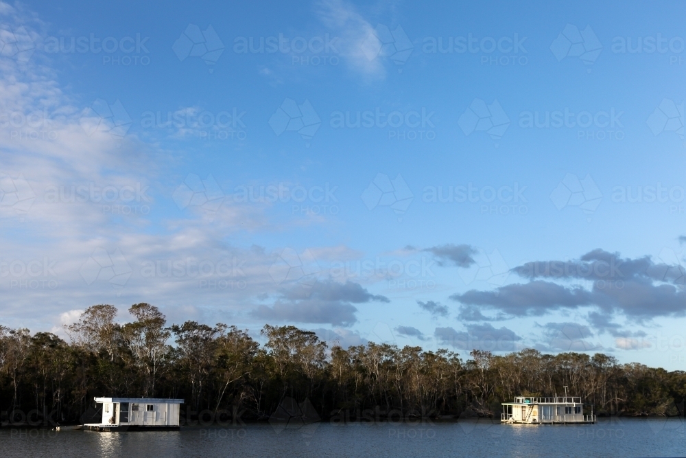 Houseboats on river - Australian Stock Image