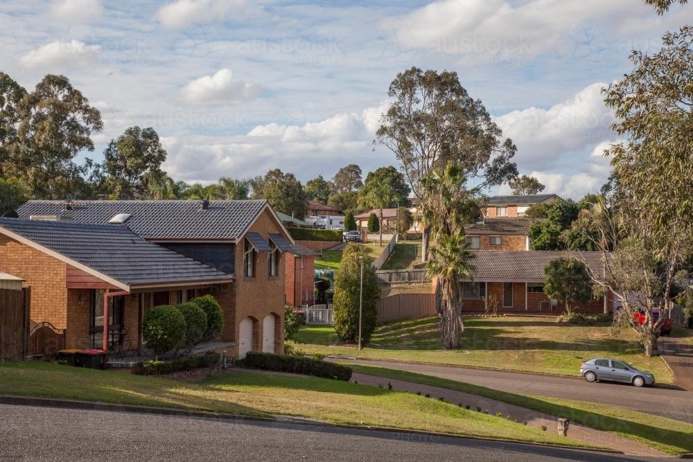 Houses, gumtrees and streets in a town - Australian Stock Image