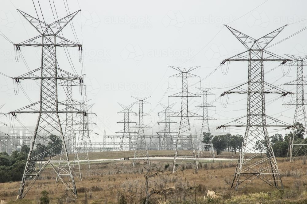 Huge metal power pole structures holding the overhead power lines - Australian Stock Image