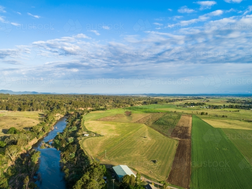Image of Hunter River running past fertile Australian farmland river