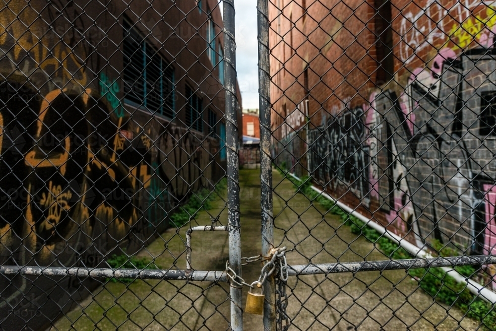 iconic grungy laneways of Melbourne city, with random graffiti - Australian Stock Image