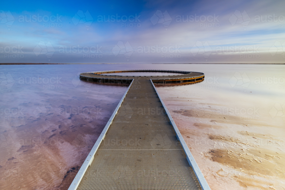 Iconic viewing platform at the famous and popular Lake Tyrrell which is a large salt lake at sunset - Australian Stock Image