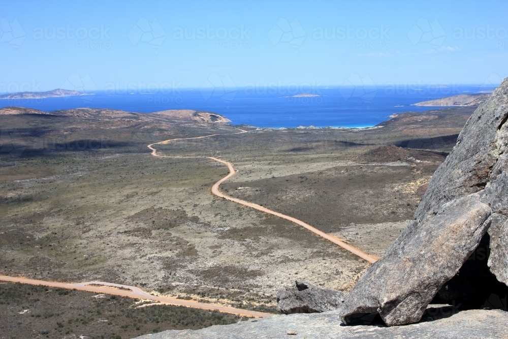 View towards ocean from top of granite peak - Australian Stock Image