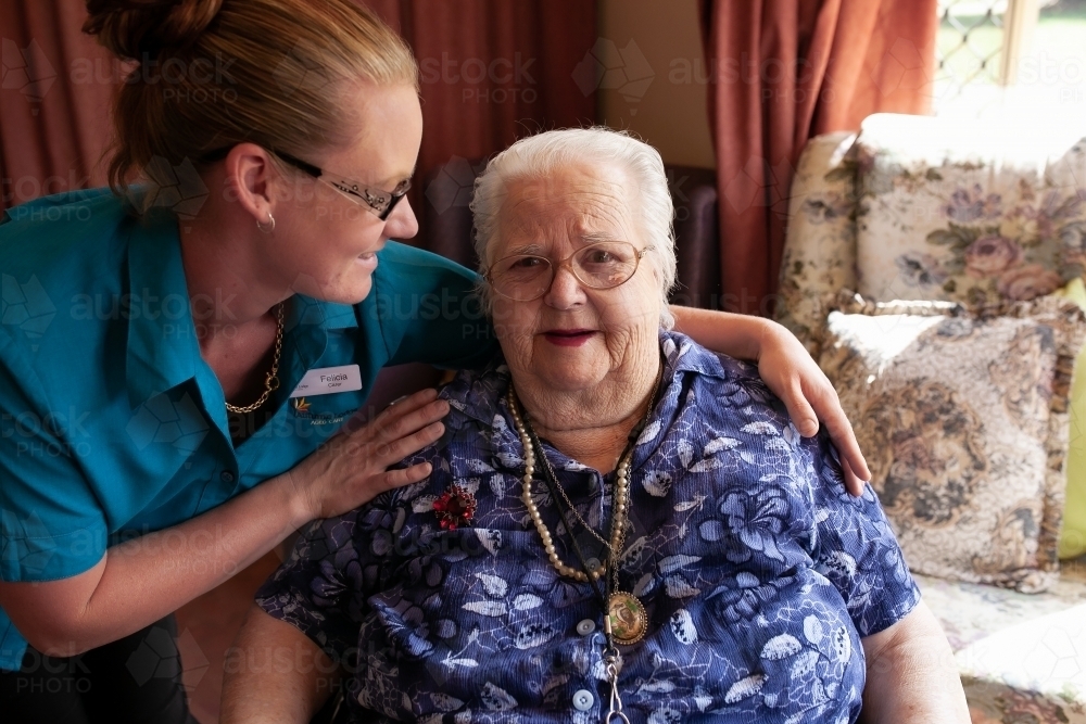 Portrait of elderly lady with carer at aged care facility - Australian Stock Image