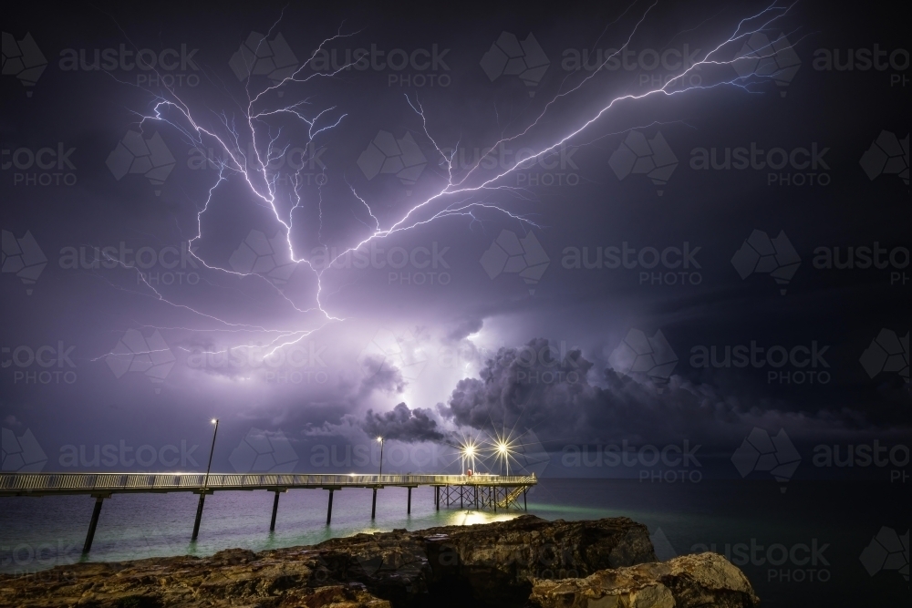 Incredible lightning over Nightcliff Jetty at night - Australian Stock Image