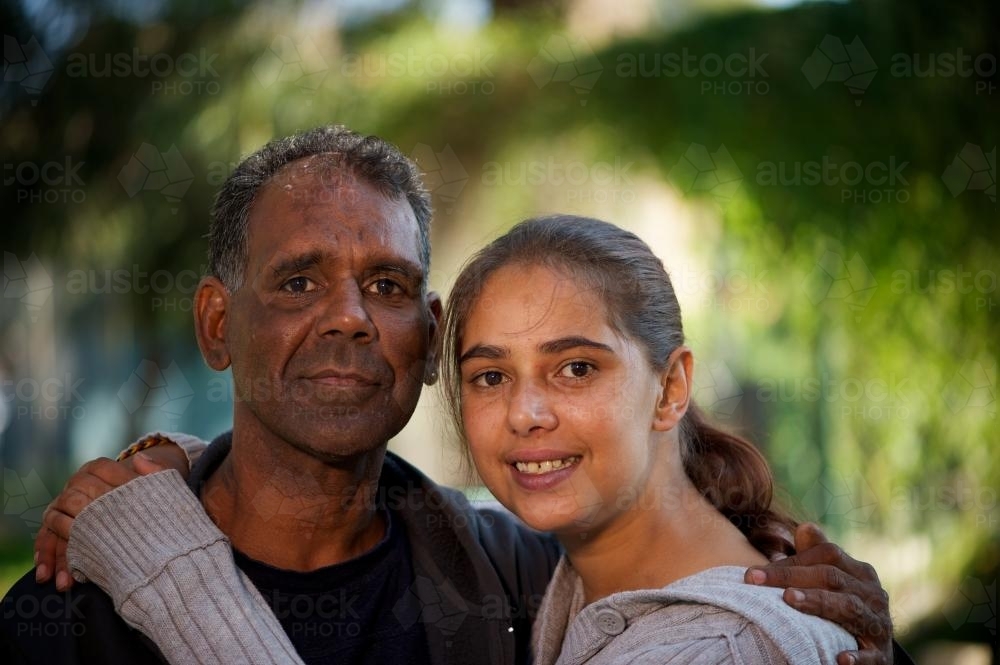 Indigenous Australian Man and Young Woman - Australian Stock Image