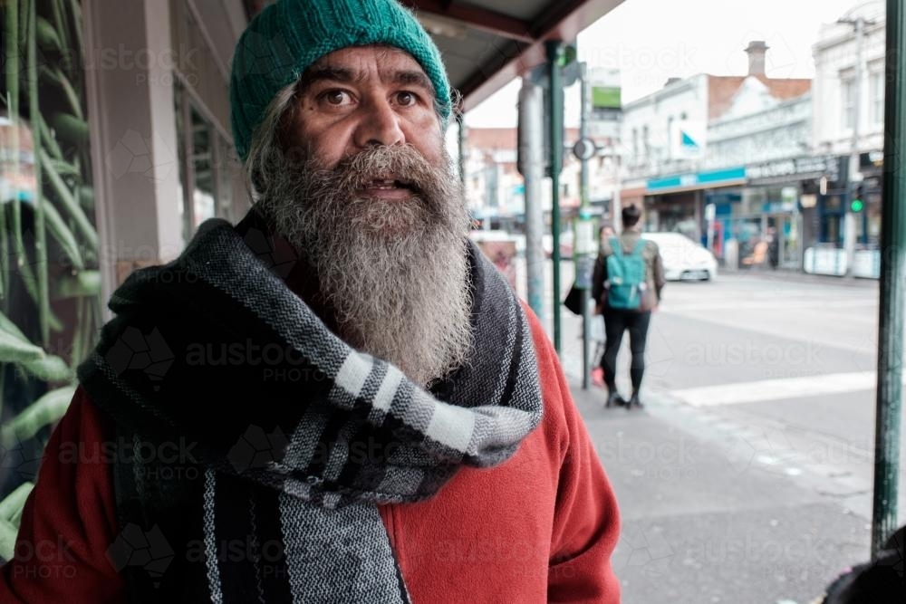 Indigenous Australian Man in an Inner Suburban Street - Australian Stock Image