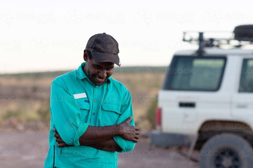 Outback Guide Person Image of Indigenous tour guide in the outback - Austockphoto