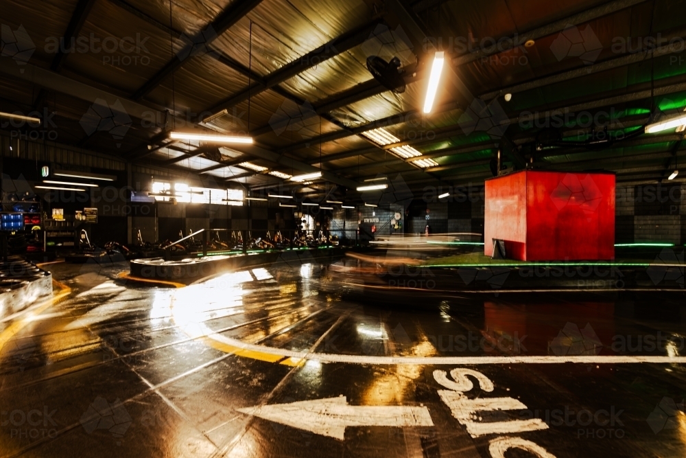 Indoor Go Kart race track with motion blur - Australian Stock Image