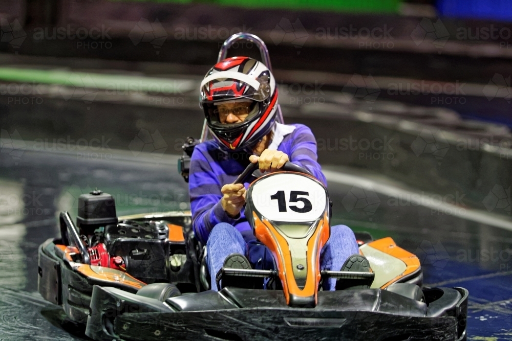 Indoor Go Kart Racing circuit arcade family fun go karting - Australian Stock Image