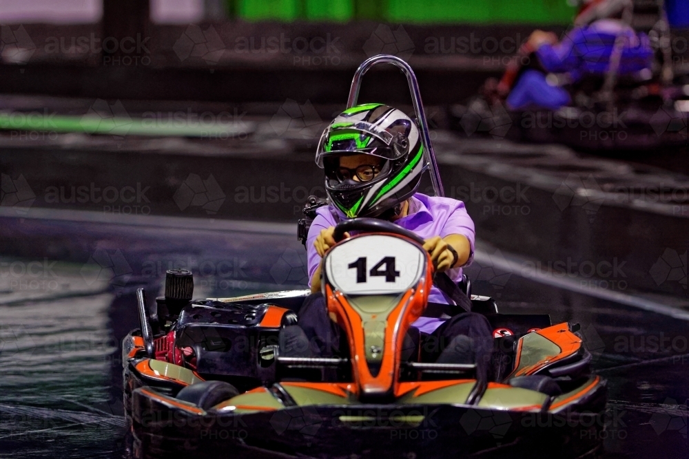 Indoor Go Kart Racing circuit arcade family fun go karting - Australian Stock Image