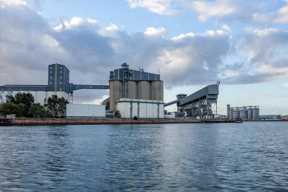 Industrial building on Harbour waterfront : Austockphoto Industrial building on Harbour waterfront - Australian Stock Image